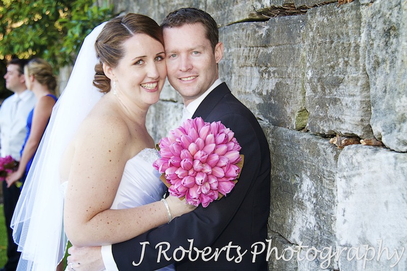 Bride and groom smiling cheek to cheek - wedding photography sydney
